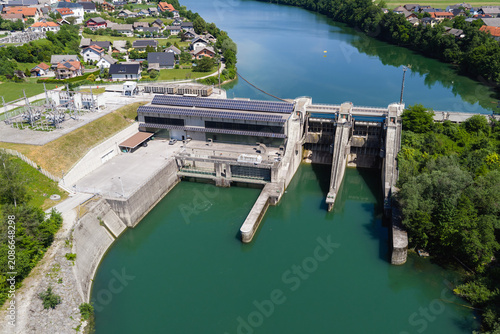 Canvastavla Power generated from water resources can be seen at this hydropower plant with solar panels on a river