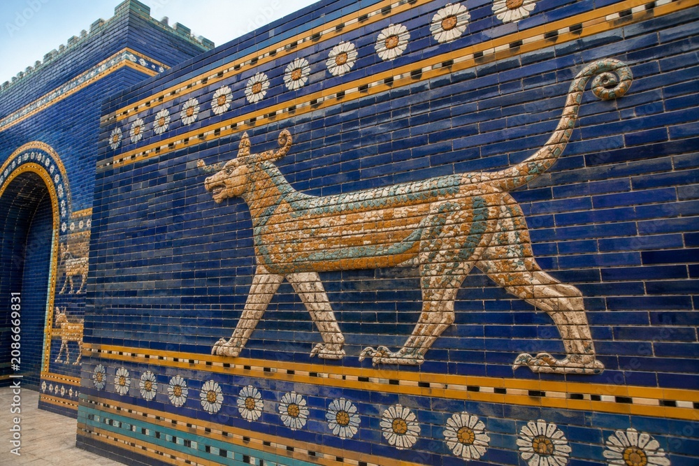 Fototapeta premium Reconstructed wall with glazed bricks depicting a patterned mythical beast.