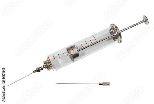 Old glass medical syringe with needle on a transparent background