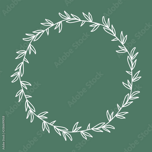 Fotografija White silhouette of round botanical frame on green background