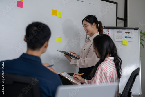 Принти на полотні Team Collaboration in Meeting Room with Whiteboard and Sticky Notes
