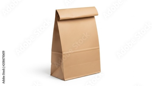 Empty brown paper bag for food delivery or shopping with a folded top edge