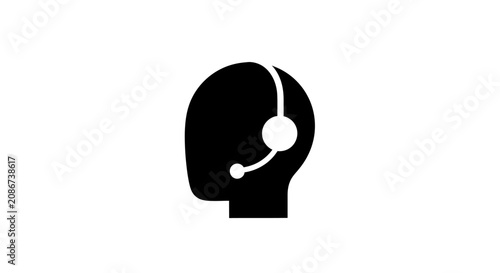 Black silhouette of a person wearing headset.