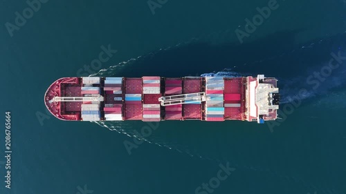 Cargo container Ship, cargo maritime ship with contrail in the ocean ship carrying container and running for export concept technology freight shipping sea freight by Express S