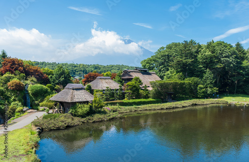 Oshino Hakkai village with pond and thatched roof houses Japan