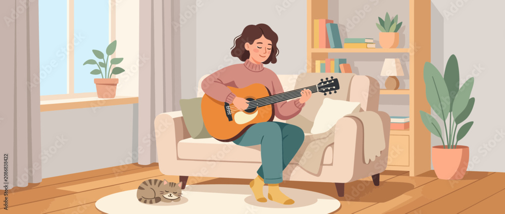 Fototapeta premium Woman playing guitar on sofa with cat