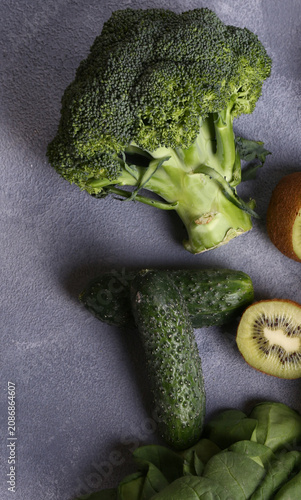 Healthy food smoothie in a bottle made from green vegetables and fruits
