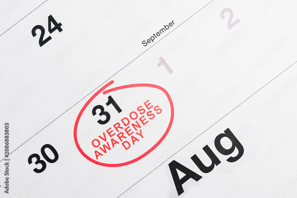 Obraz premium A close-up shot of a calendar page with August 31 circled in red ink and the text Overdose Awareness Day written inside, highlighting the international awareness day