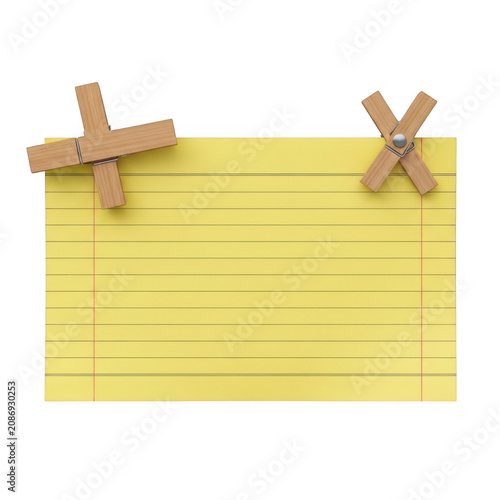 Yellow lined paper note attached with wooden clothespins