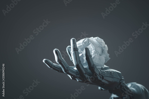 Canvastavla Futuristic concept of a robotic hand holding a crumpled paper ball, symbolizing artificial intelligence, problem solving, creativity, discarded ideas, innovation process and thinking in automation