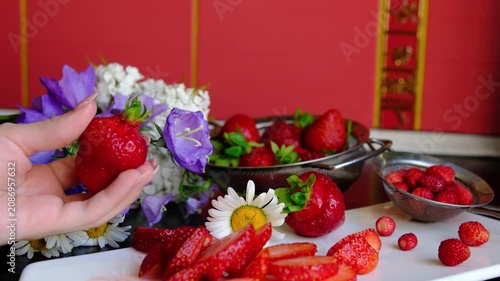 to cut strawberries. Fresh sliced strawberries, close up view. Strawberry background