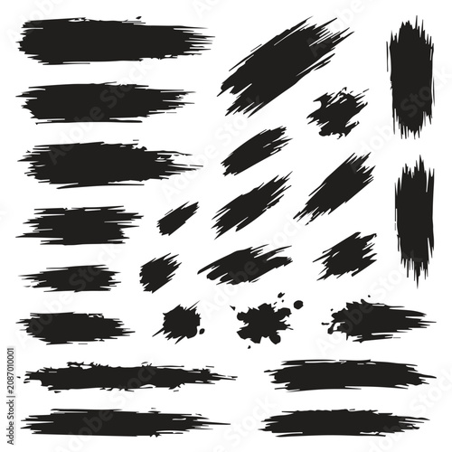 Assorted grunge paint brush strokes and ink splatter elements with splatter