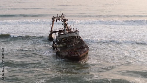 Aerial orbiting shot of the Zeila shipwreck on the Skeleton Coast in Namibia, southwest Africa.	
