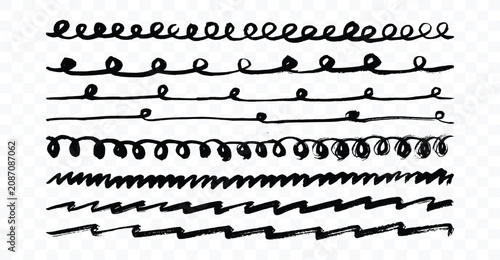 Photos Set of scribbled hand-drawn curled and zigzag divider lines for design accents w