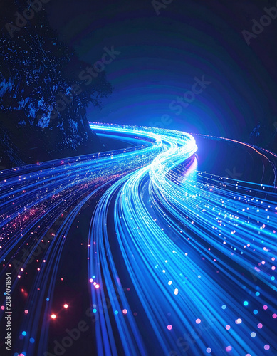 Dynamic blue fiber optic light trails flow like a digital highway around a dark cliff at night, symbolizing fast data connection and futuristic technology. No people.