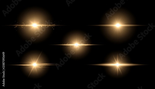 Warm golden glow light sparks and flares set on black 黒背景の黄金のグロウ光エフェクト イラスト