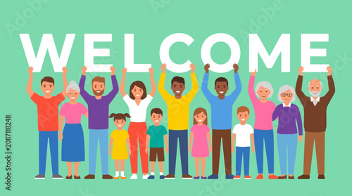 Diverse group of people celebrating with raised arms in a lively outdoor event with welcome sign