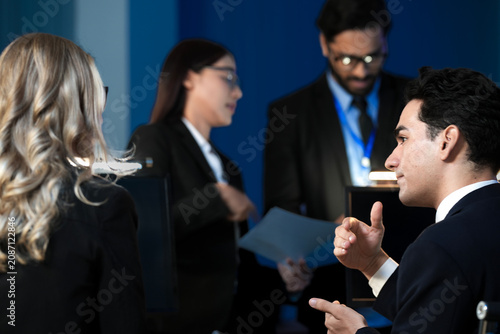 Fotografie Data integrity check night shift Diverse team meticulously audits financial performance comparing figures tablet screen printed reports ensuring accuracy crucial validation process underway hub