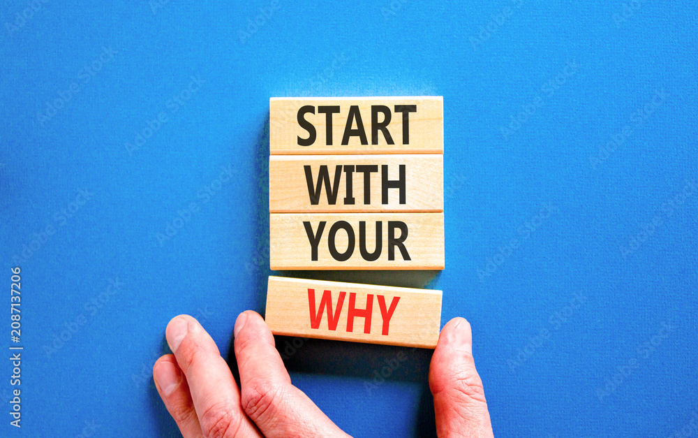 Obraz premium Start with your why words symbol. Concept words Start with your why on beautiful wooden blocks. Beautiful blue background. Businessman hand. Business start with your why concept. Copy space.