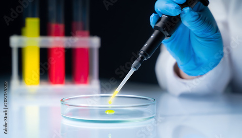 A scientist using scientific techniques to uncover clues from chemical samples in a crime lab.
Lab concept.