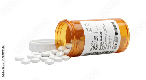 фотографія Generic medication spilling from an orange prescription bottle onto a white surf