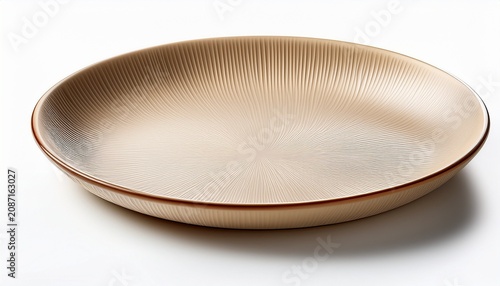 Cream Colored Plate With A Ridged Rim Circular Design And Textured Surface Isolated On White Background