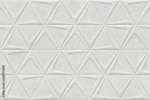 Photos Geometric Tessellation: A seamless pattern of embossed, interlocking triangular forms creates a tactile and visually dynamic textured background