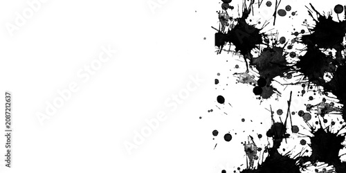 Tableau sur toile Black ink splatters on white background