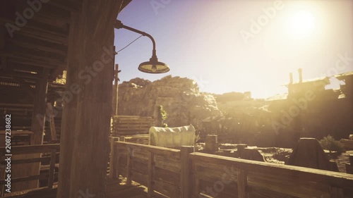 Golden sunset over dusty main street, lamppost silhouette against wooden storefronts, long shadows stretching toward quiet horizon, warm glow evoking nostalgic