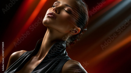 beautiful woman with laser facial skin scan, serene female portrait with futuristic scanning lines, cosmetic dermatology concept with facial laser analysis