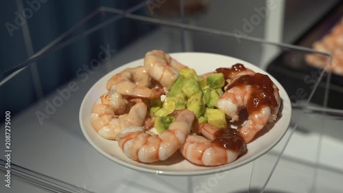 Professional Catering Service Serving Shrimp Cocktail Appetizer