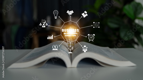 Foto Illuminated Concept of Business Relationships and Connections with Icons Emerging from an Open Book on Table in Modern Office Environment Quark