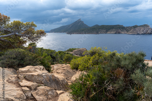 Scenic panoramic view of a rocky island surrounded by deep blue Mediterranean waters