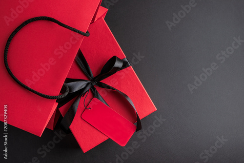 Red shopping bag with gift box for Black Friday sales