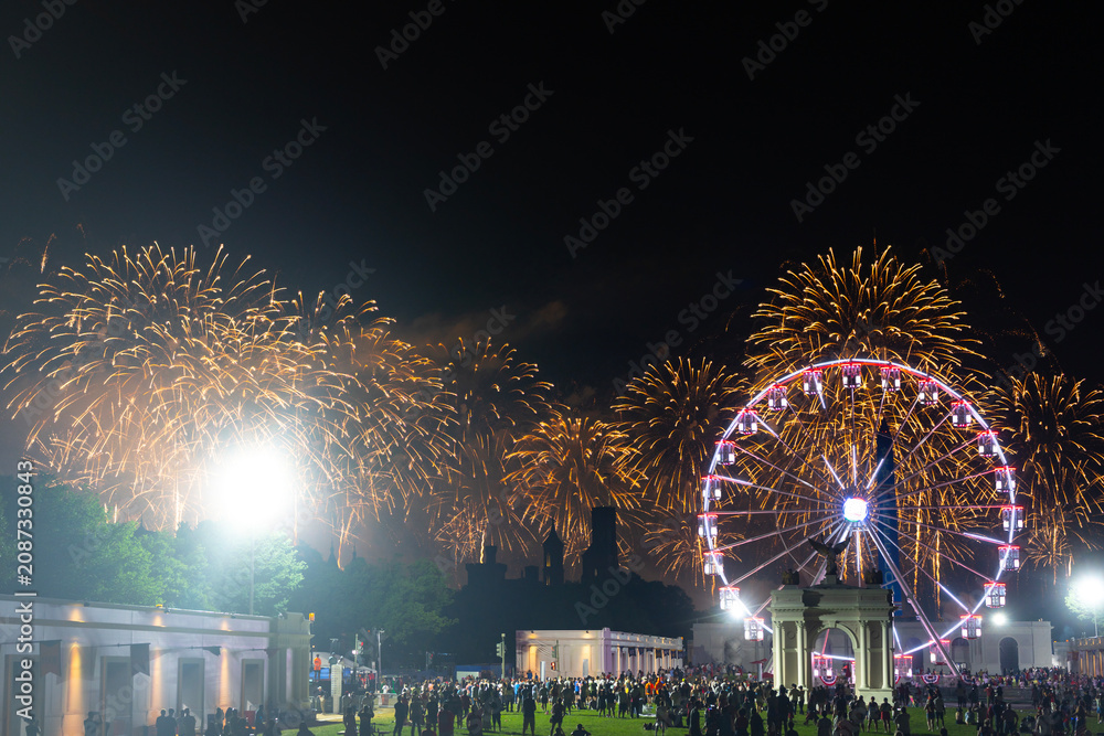 Fototapeta premium Fireworks over Washington DC night. Golden fireworks mark America 250. National fireworks festival near monument. Fireworks honor American freedom celebration. Monument firework.
