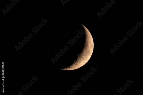 Canvas-taulu Crescent moon against black night sky
