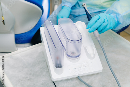 Fotografija Ultrasonic scaler in the dental office. Dentistry Concept