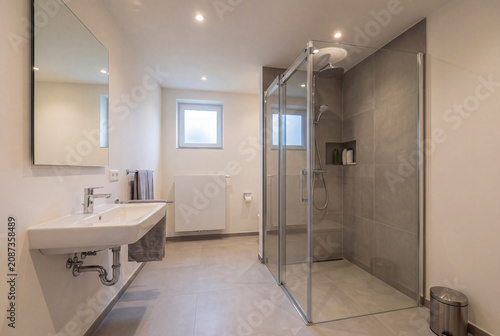 Modern Bathroom Interior with Glass Shower and Basin Sink