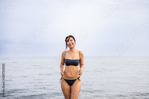 Woman enjoying a serene day at the seaside