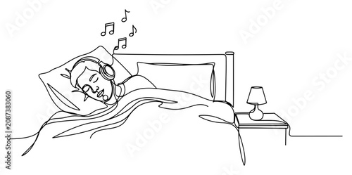 Canvas Print Person sleeping in bed while listening to music with headphones in minimalist co