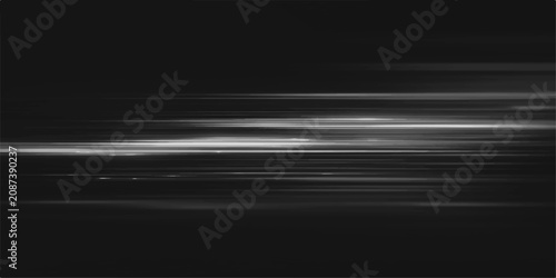 Tableau sur toile Abstract light trails in monochrome create a dynamic and futuristic motion blur effect, hinting at speed and technology in the darkness