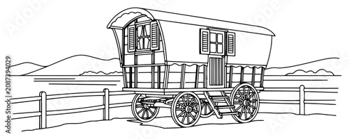 Fotografie Vintage wooden caravan wagon in scenic countryside landscape in minimalist line