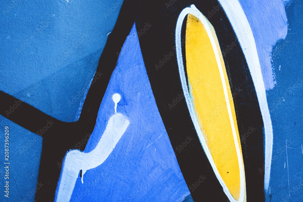 Fototapeta premium Urban graffiti wall in blue, yellow, black colors, 90s, Y2K style, street art, grungy texture. Posters, digital art, social media, modern 90s, 2000s, y2k creative banner, summer visuals.