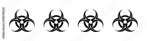 Tableau sur toile Row of four black biohazard symbols on a white background