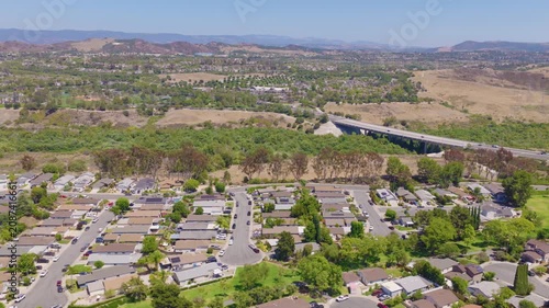 Mission Viejo, California Lateral Aerial of Homes, Traffic and Rolling Hills 01