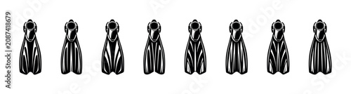 Foto Row of black diving fins arranged in a pattern for water sports and swimming