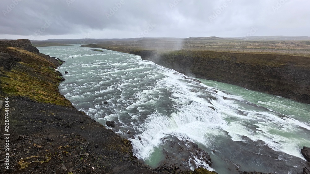 Fototapeta premium Goðafoss Waterfall and Volcanic River Landscape in North Iceland
