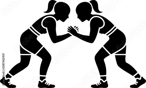 Two female wrestlers in a grappling stance