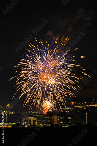 Fireworks over the Rio Grande Valley for the 250th birthday of the USA near Albuquerque New Mexico at sunset