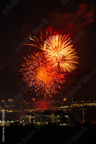 Fireworks over the Rio Grande Valley for the 250th birthday of the USA near Albuquerque New Mexico at sunset